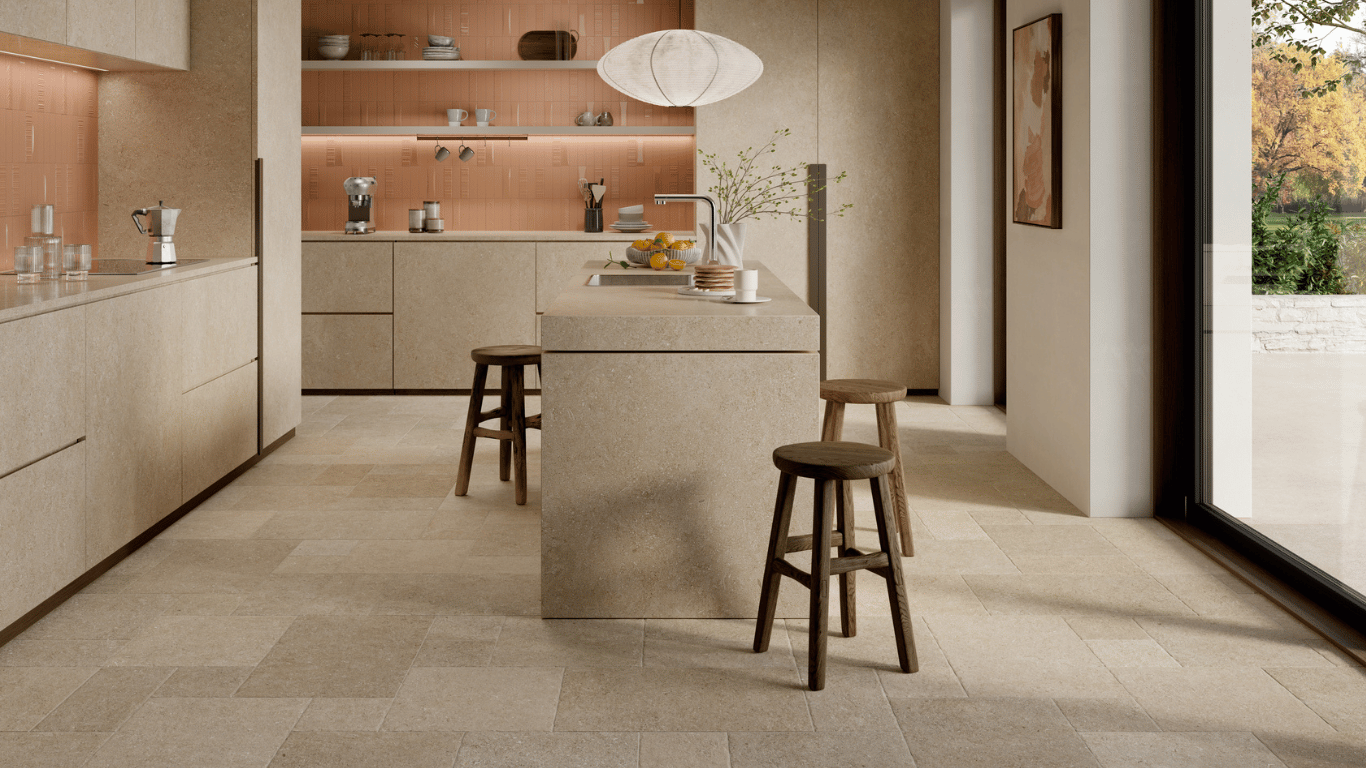 Country kitchen with traditional stone effect travertine floor tiles in a modular design